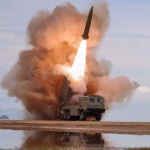 A rocket launcher fires a munition during tests in North Korea, June 25, 2026, in this picture released by North Korea's official Korean Central News Agency. KCNA via REUTERS/File Photo