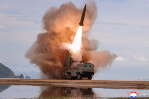 A rocket launcher fires a munition during tests in North Korea, June 25, 2026, in this picture released by North Korea's official Korean Central News Agency. KCNA via REUTERS/File Photo